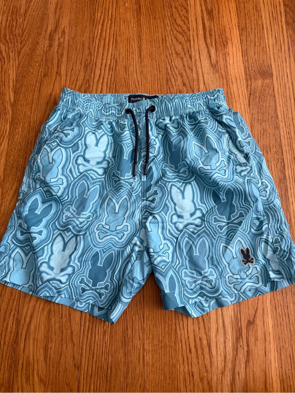 Psycho Bunny blue bunny logo beach swim trunks L 14/16